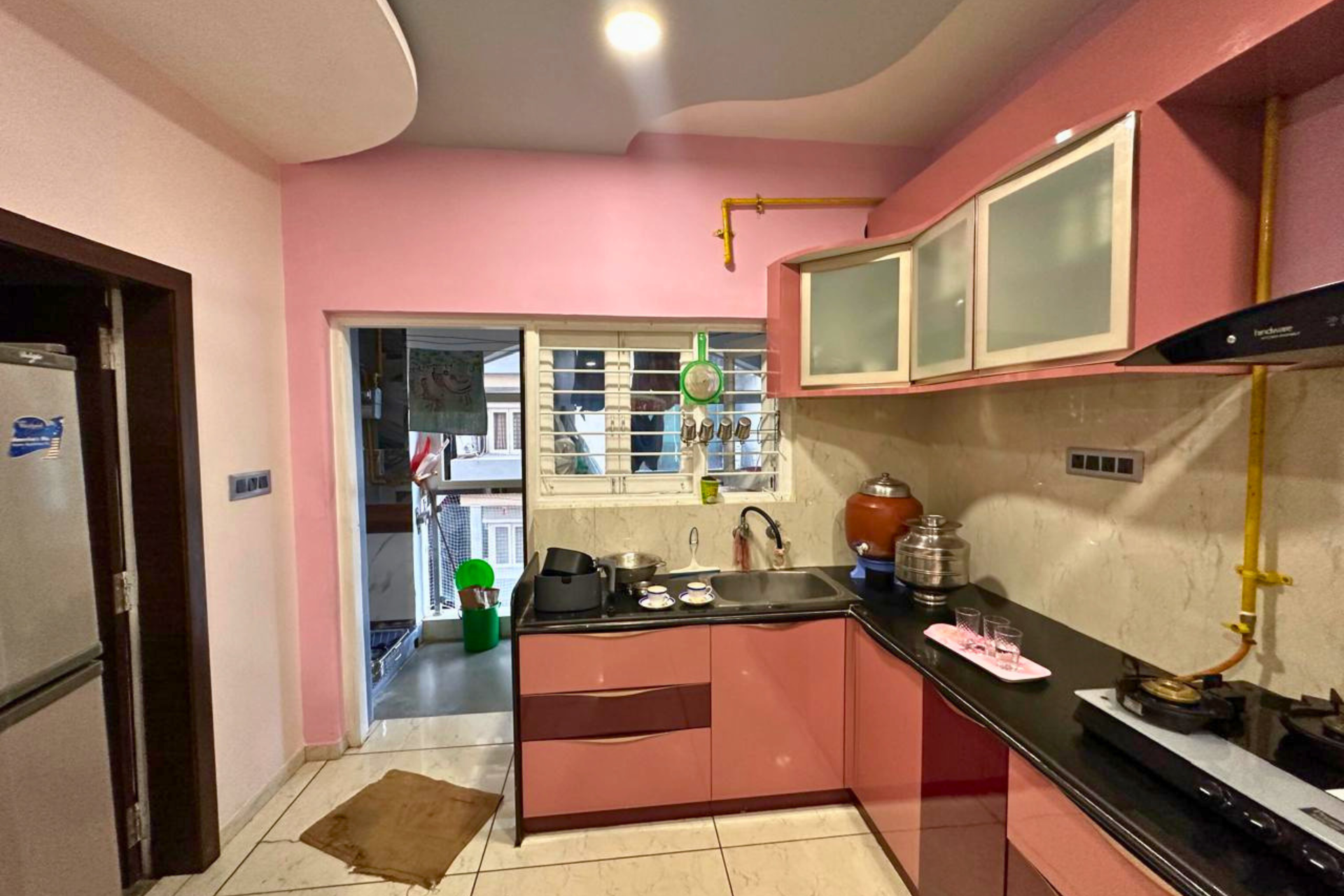 Pink kitchen perspective modular design interior Ahmedabad KBEX